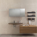 Modern bathroom with beige concrete effect wall tiles wooden vanity, mirror and shelves.