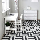 Classica carrara and nero marquina marble effect tiles laid in a basketweave pattern