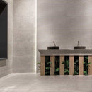 Modern bathroom interior with tiled walls and floor and a wooden vanity.