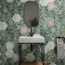 Bathroom with hexagonal tiles, white sink, and mirror.