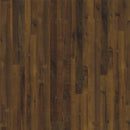 Brown wood plank flooring with a distressed finish, showing natural grain, knots, and varied tones from medium to dark brown.