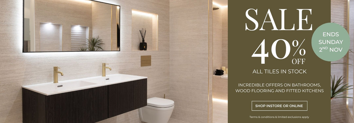 Beige bathroom with green overlay promoting Autumn Sale with 40% off all tiles in stock