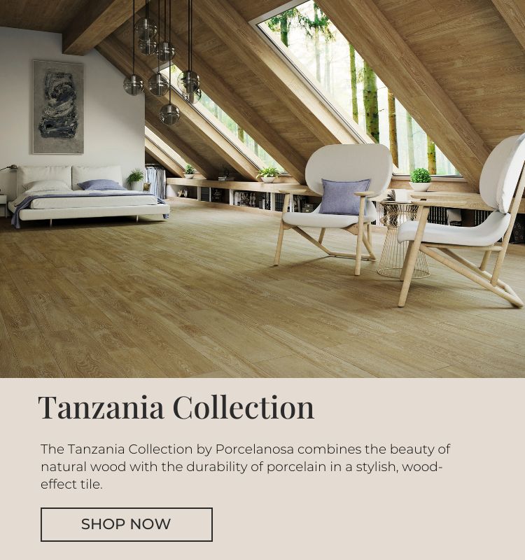 Tanzania wood effect tiles on bedroom floor with two armchairs and side table.