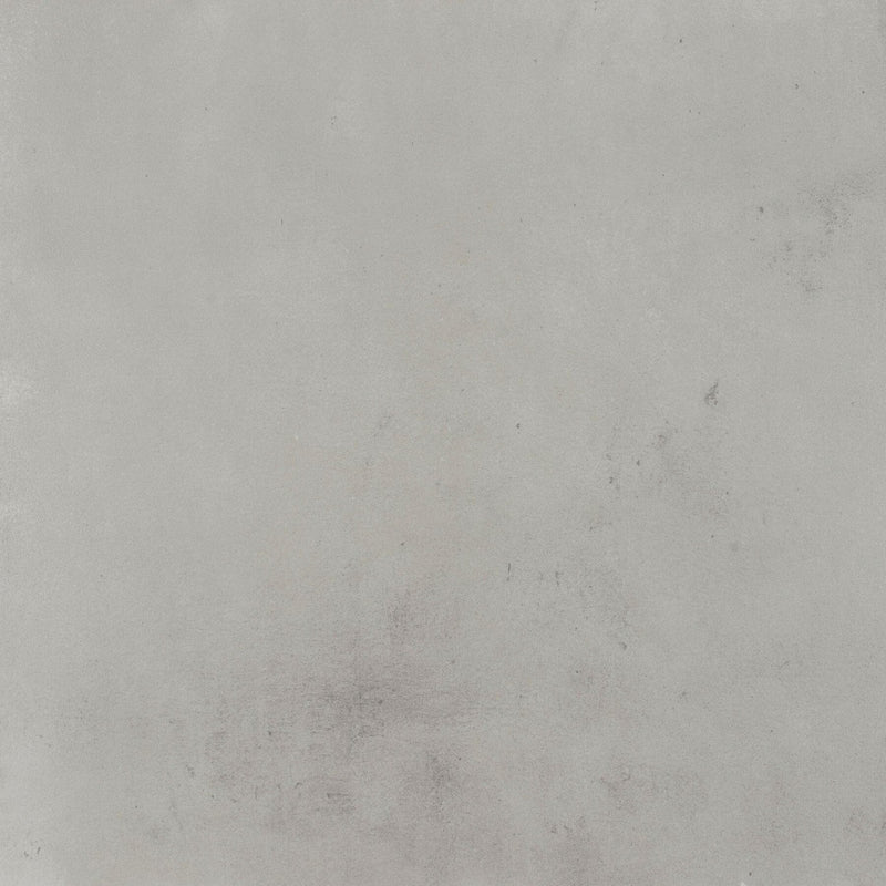 Grey concrete effect floor tiles.