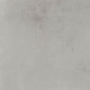 Grey concrete effect floor tiles.