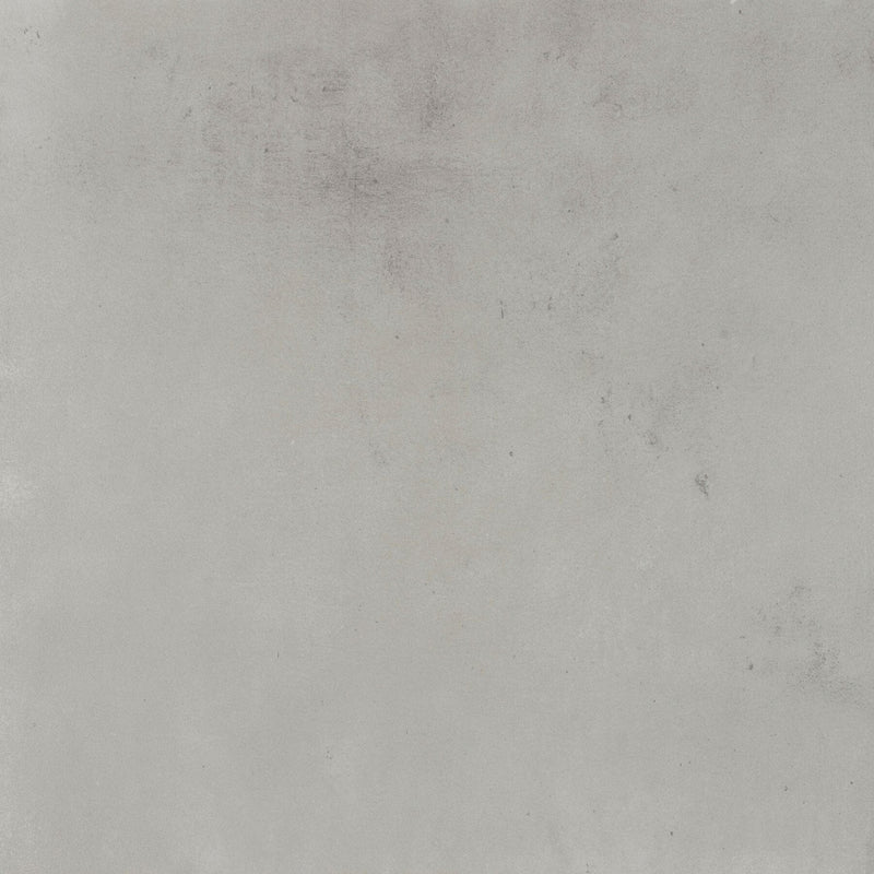 Grey concrete effect floor tiles.