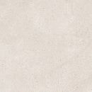 Square beige stone effect tile.