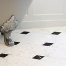 Classica white marble effect tiles with small black marble effect tozz