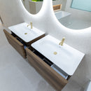 Bathroom vanity with two white sinks and brushed brass taps, featuring wooden cabinets.