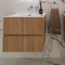 Bathroom with wooden wall mounted vanity unit.