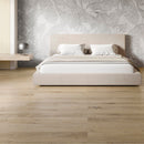 Bedroom with wood effect luxury vinyl flooring.