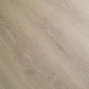 Close-up of wood effect luxury vinyl flooring planks.