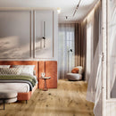Bedroom with terracotta coloured headboard and engineered oak flooring.