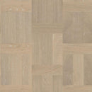 Close up of a white stained engineered oak floor laid in a dutch pattern.