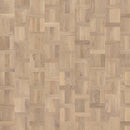 Close up of an engineered oak floor laid in a dutch pattern.