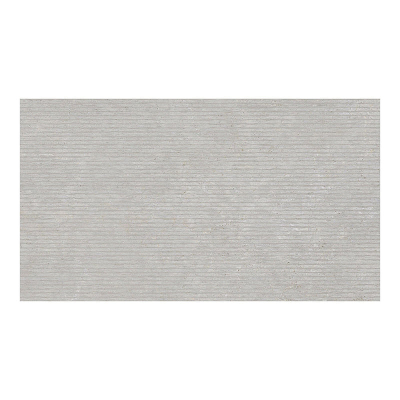 Rectangular textured grey wall tile on a white background