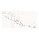 Marble effect tile with grey brown veining on a white background.