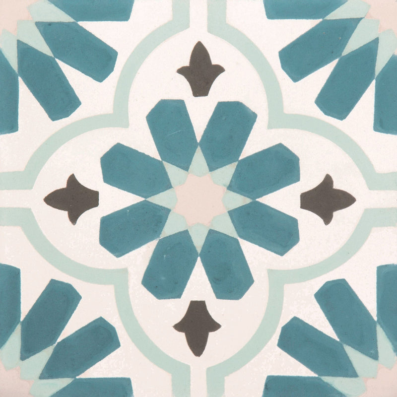 Decorative tile with geometric pattern in teal, gray, and white