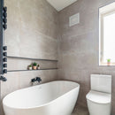 Tiled bathroom with freestanding bath